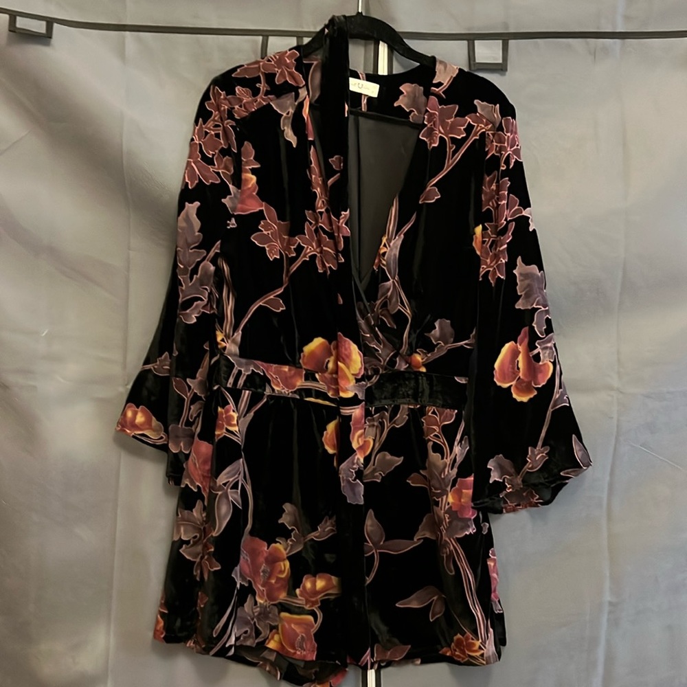Polyester jumpsuit by Just in - size small 100% polyester